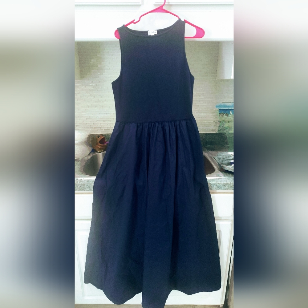 The Drop/Dress navy blue.Pockets sz Lg top has stretch